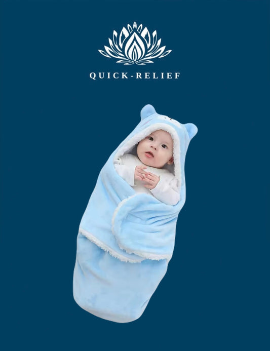 Baby wrapped in a blue swaddle blanket with 'Quick-Relief' logo on a dark blue background